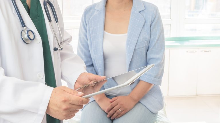 Doctor giving Smart Forms